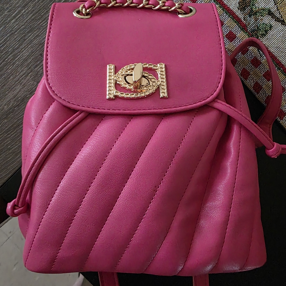 Bebe Fuchsia Quilted Backpack with Gold Accents